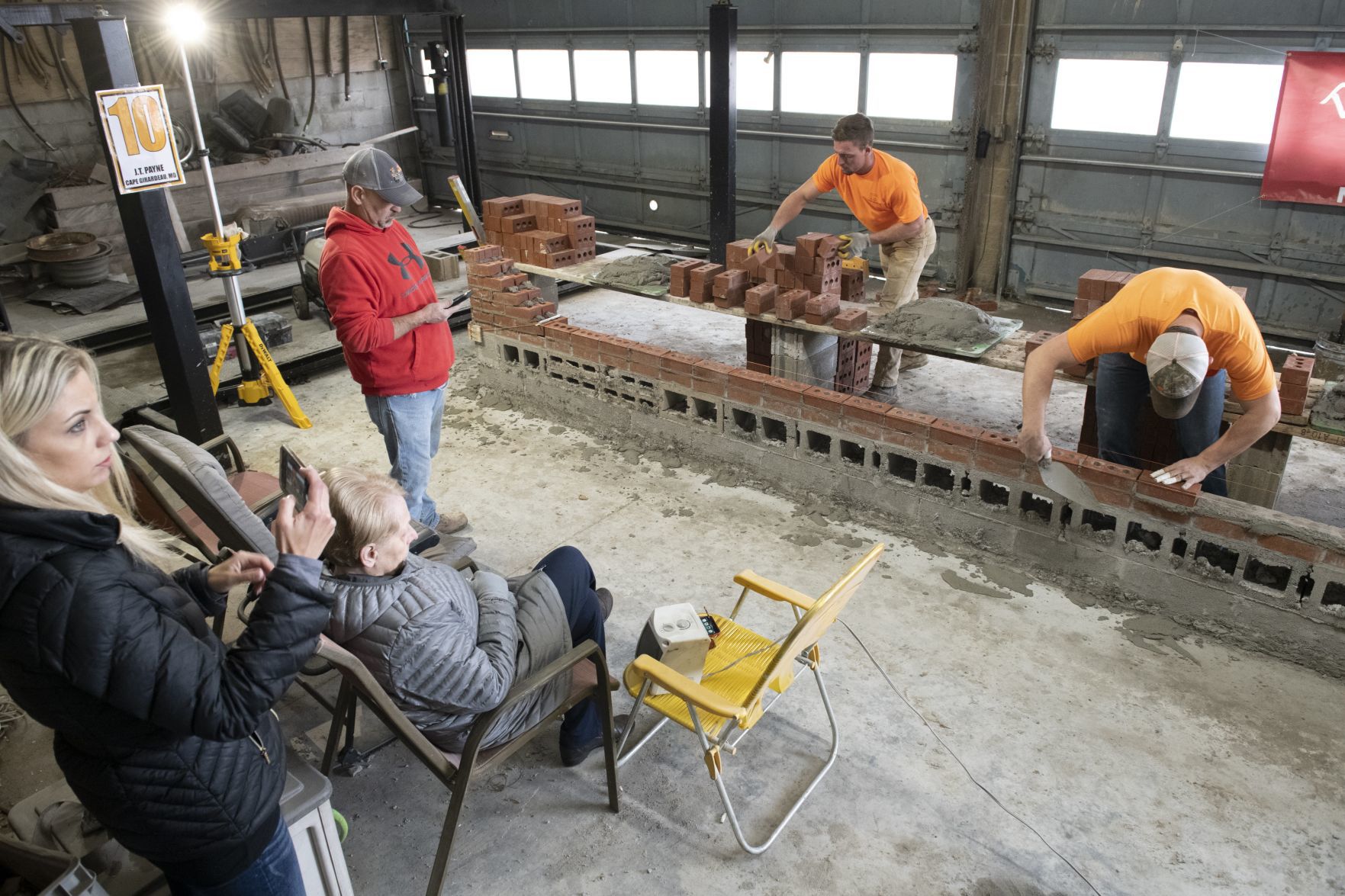 Payne lays bricks, hope for a victory in Bricklaying Contest
